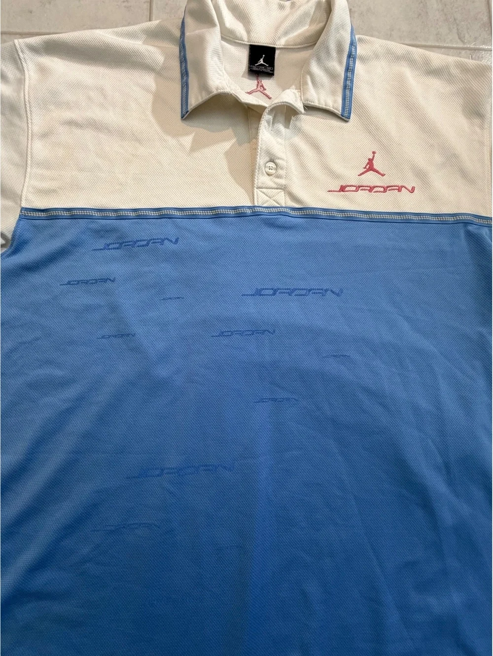 Jordan blue and white short sleeve polo shirt